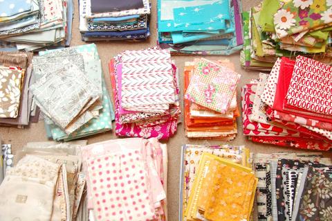 Piles upon piles of fabrics.