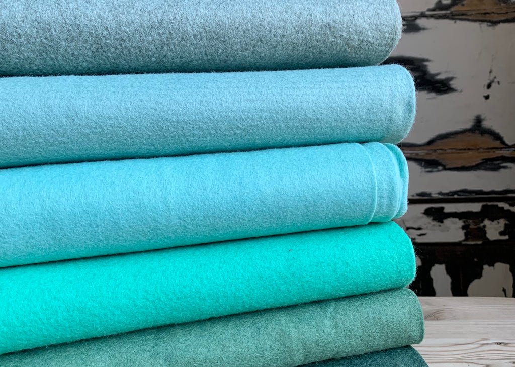 mint, green and blue woolfelt stack at the eternal maker
