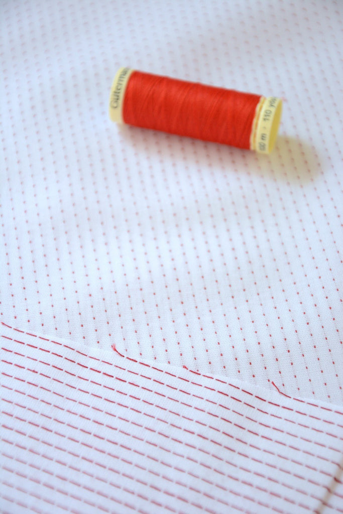 Robert Kaufman Fabric Stitched - White Red Pin Dot by Robert Kaufman