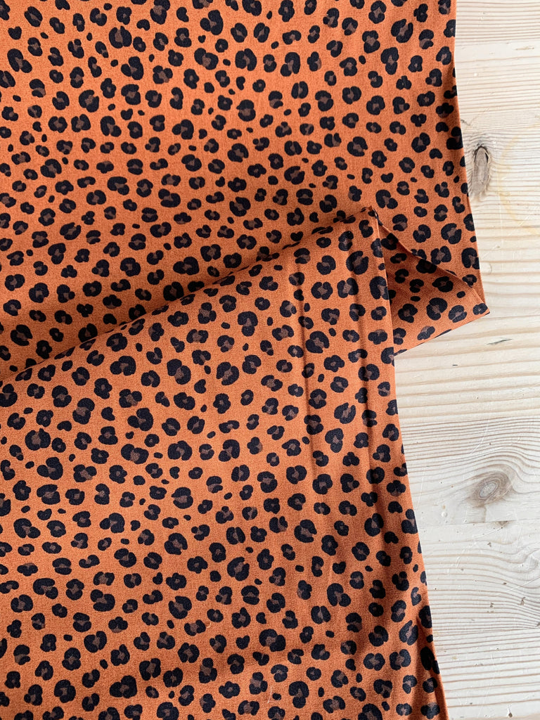 Unbranded Fabric Little Leopard on Rust - Cotton Poplin